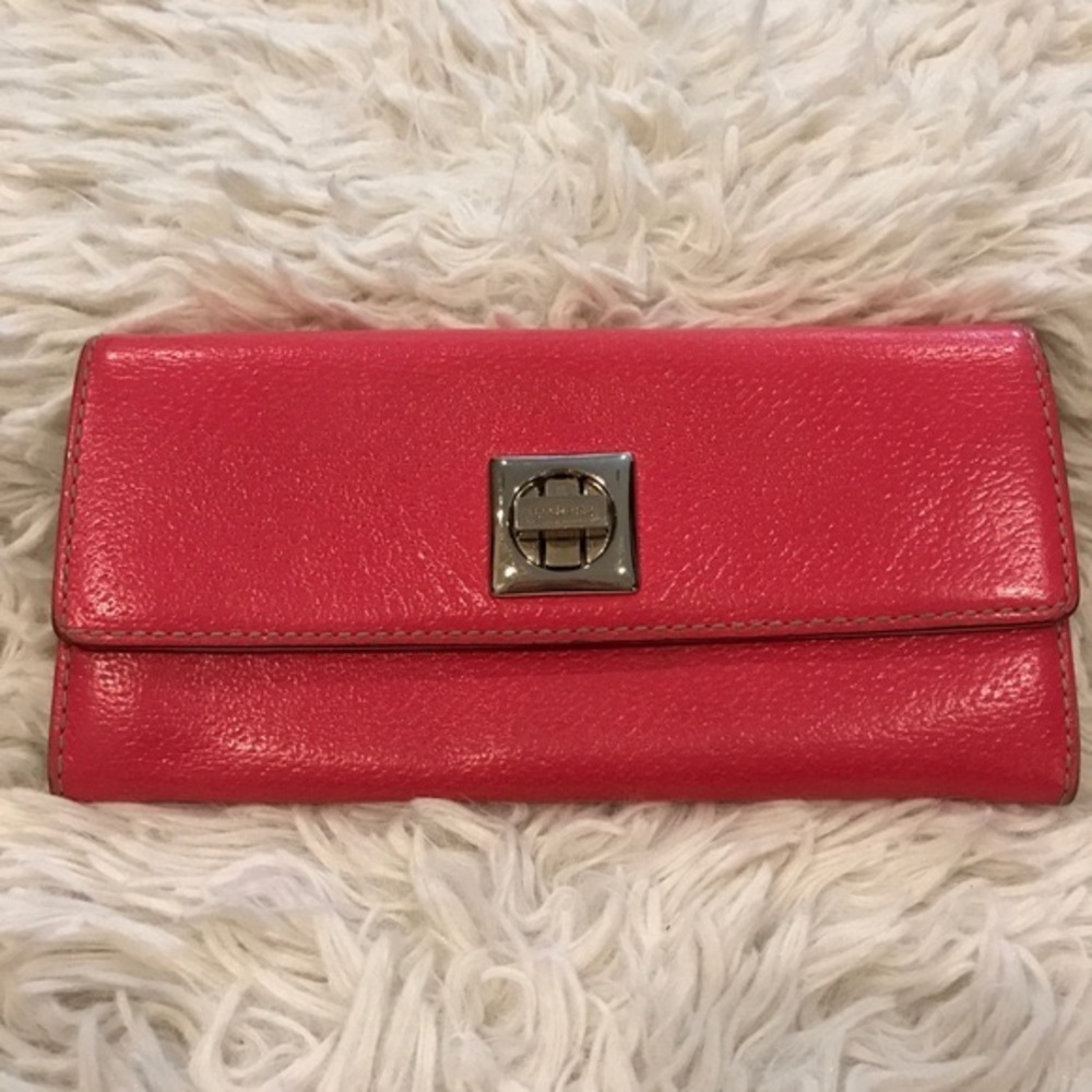 Kate Spade pink leather multi sectional wallet, silver clasp, zip pocket.